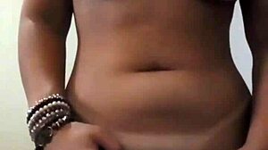 piercing her wet pussy lips for intense pleasure
