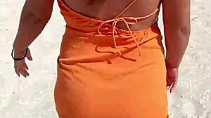 doesn't this horny mexican puta flashing her thong and tits on public beach turn you on?