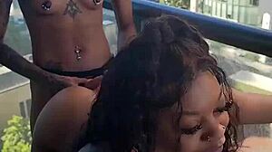renity love straps kashofficials on the balcony outside