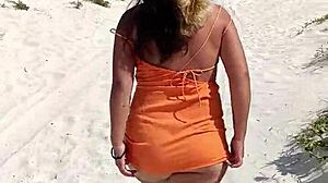doesn't this horny mexican puta flashing her thong and tits on public beach turn you on?