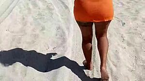 doesn't this horny mexican puta flashing her thong and tits on public beach turn you on?