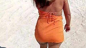 doesn't this horny mexican puta flashing her thong and tits on public beach turn you on?