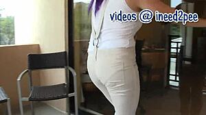 Persian beauty soaks her tight jeans peeing uncontrollably in ecstasy