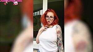 Redhead babe washes windows wearing wet t-shirt at home