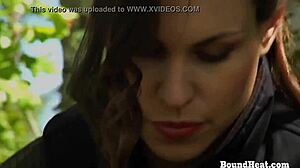 Curvy lesbian slave gets caught chained outdoors dominated by strict mistress
