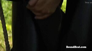 Curvy lesbian slave gets caught chained outdoors dominated by strict mistress