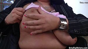 Cecille black enjoys playing with huge boobs and dildo