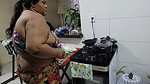 chubby stepmom's big tits shake wildly during kitchen pounding