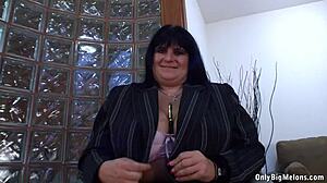 Cecille black enjoys playing with huge boobs and dildo