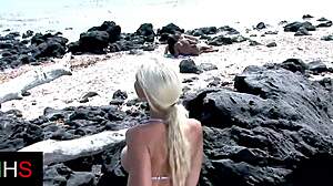 Amazing girl enjoys beach time with black man while watched