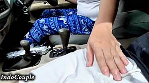hijab wife plays with cock in car