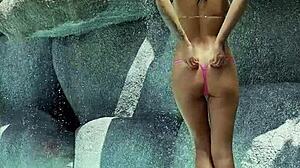hot monika fox poses in pink bikini outdoors