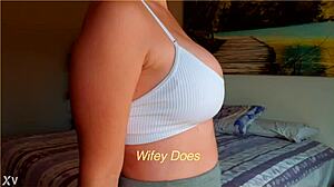 milf shows big tits in white sports bra