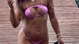 Micro bikini model poses confidently