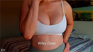 milf shows big tits in white sports bra