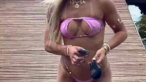 Micro bikini model poses confidently