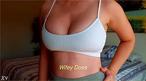 milf shows big tits in white sports bra