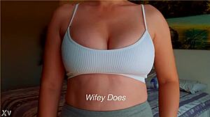 milf shows big tits in white sports bra