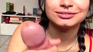 Cute brunette gives handjob and blowjob to big cock