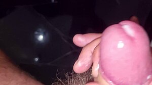 Man in towel strokes hard with close up finish