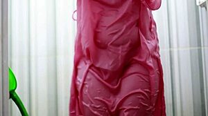 indonesian girl bathes wearing transparent satin dress