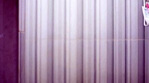 indonesian girl bathes wearing transparent satin dress