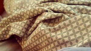 Horny milf seeks hairy pussy under the sheets!